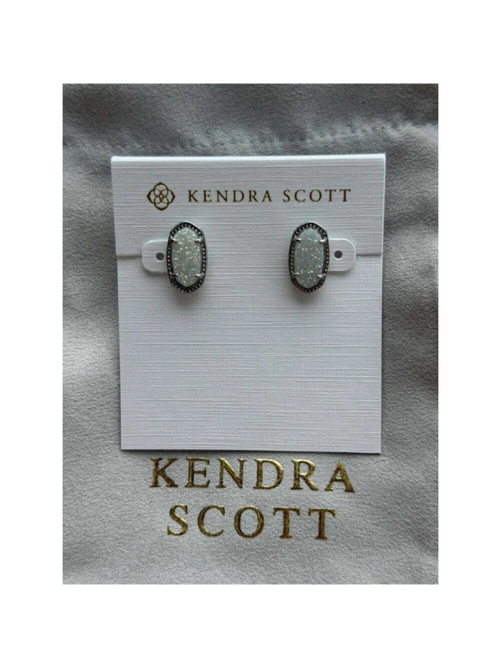 Kendra Scott silver earrings